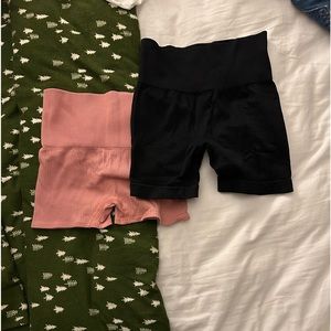two colsie shorts. pink is xs and black is s